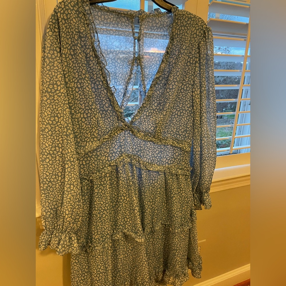 A beautiful dress that I bought from a boutique. It never has been worn.
